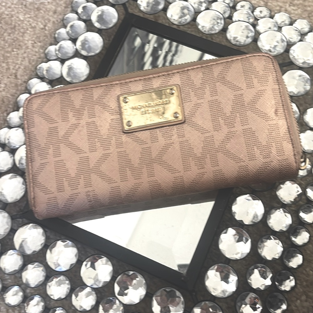 MK rose gold used wallet.